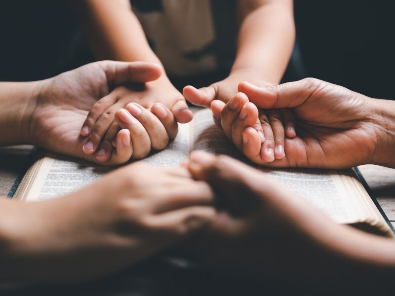 Family praying at the end of the day celebrating St. Valentine's Day.